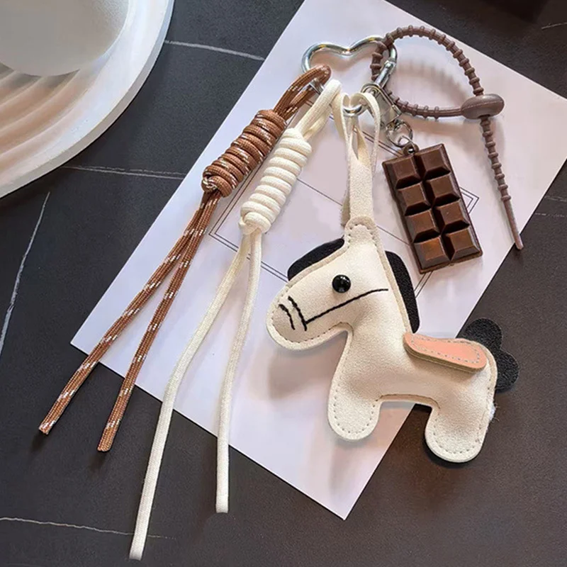 جديد INS نمط الجلود الحصان العام حقيبة الهاتف المحمول حبل معلق الإبداعية الهاتف الحقيبة المفاتيح ملحق من البر الرئيسى للصين