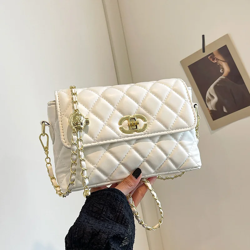 

Women's Quilted Crossbody Bag with Adjustable Chain Strap & Gold Ball. Versatile Day-to-Night Shoulder Purse, Perfect for Dating
