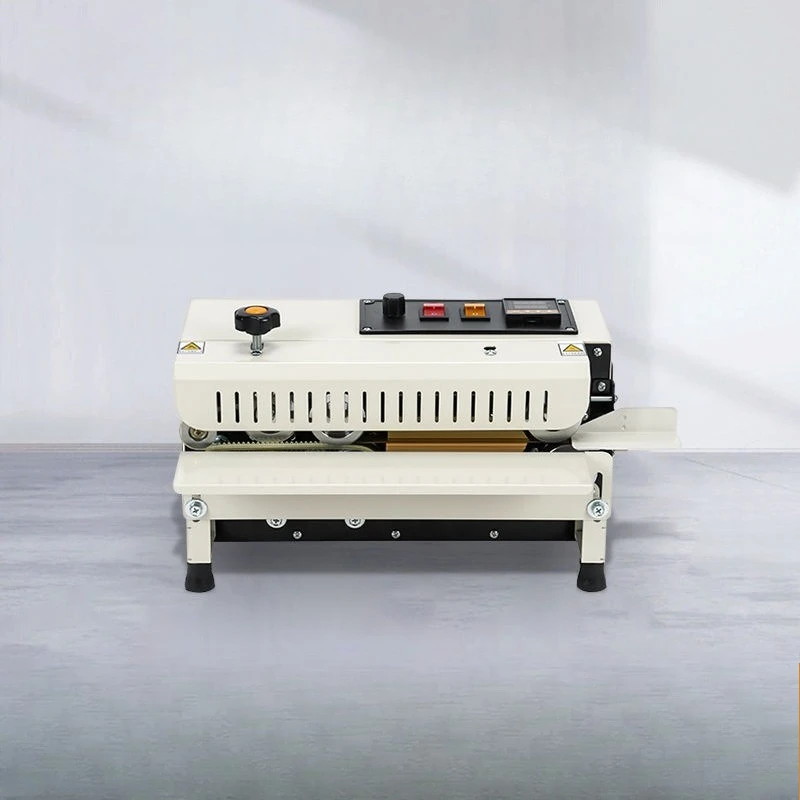 

Continuous sealing machine, commercial aluminum foil plastic PE bag packaging machine