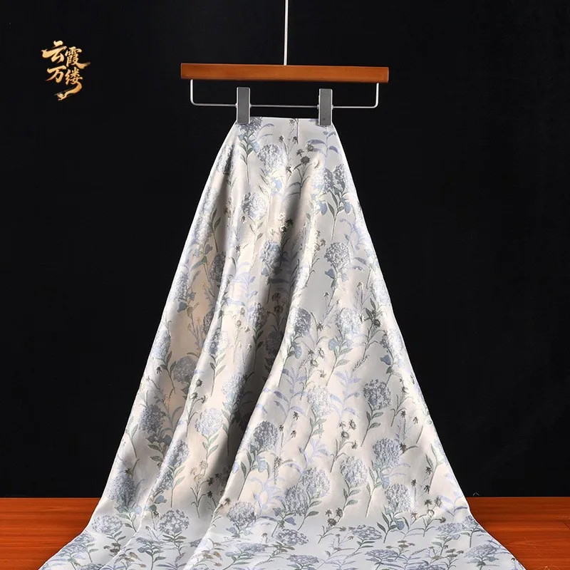 The fabric of Chinese-style hydrangea gold thread three-dimensional relief shawl dress is ethnic style