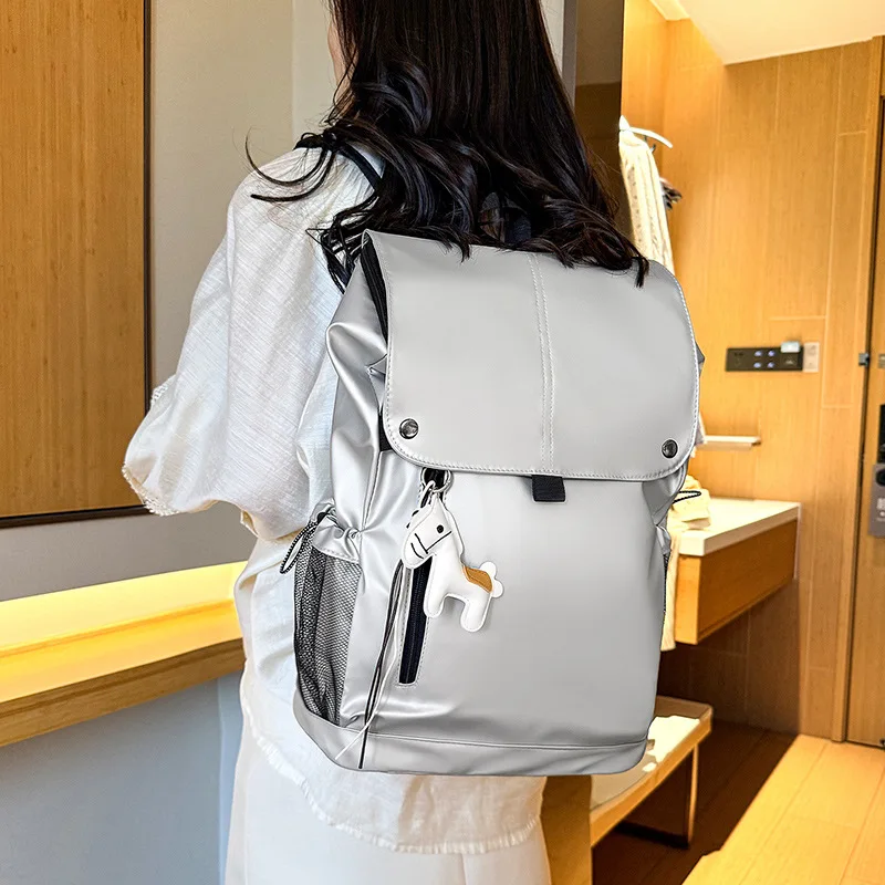 New outdoor travel mountaineering bag New large-capacity solid color backpack bag Fashion versatile flip casual backpack