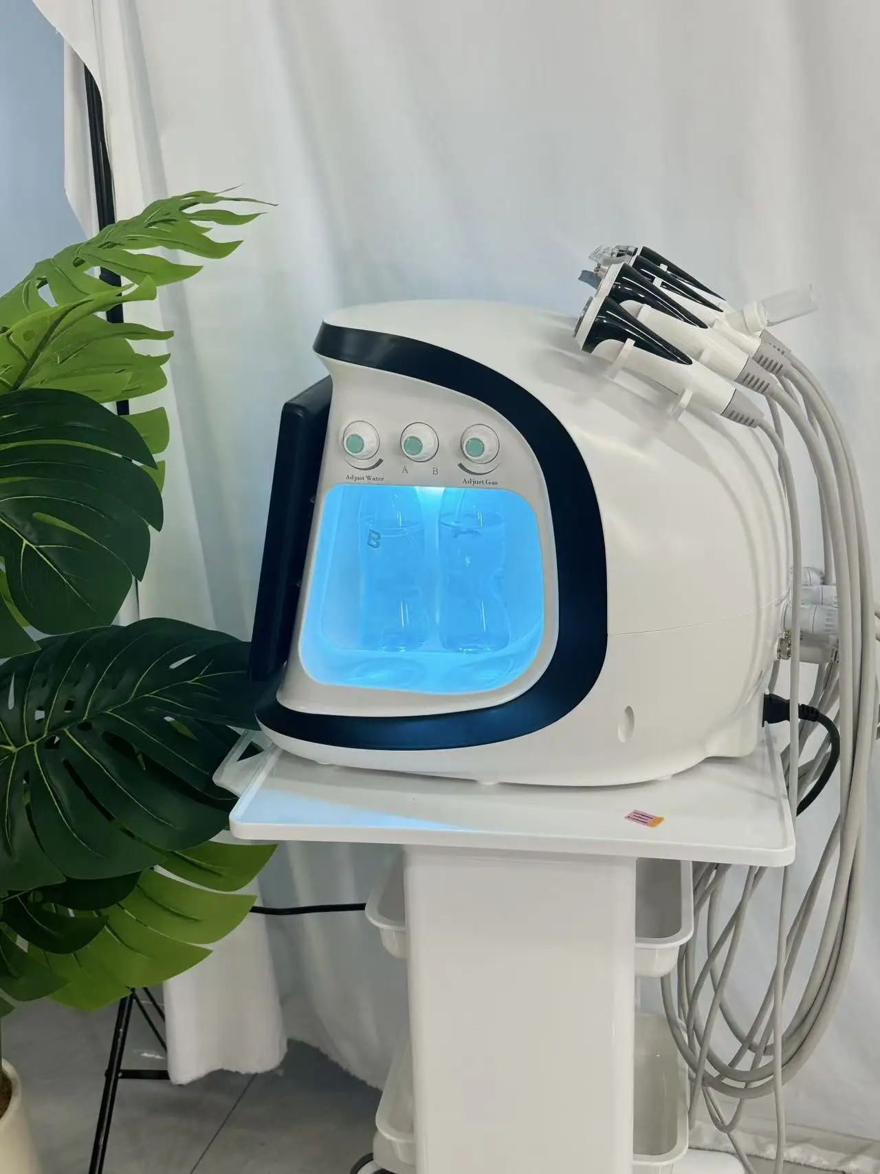 جهاز ذكي جديد للأكسجين المائي باللون الأزرق الجليدي منظف الوجه ذو الفقاعات الصغيرة يزيل الجلد الميت والرؤوس السوداء على f