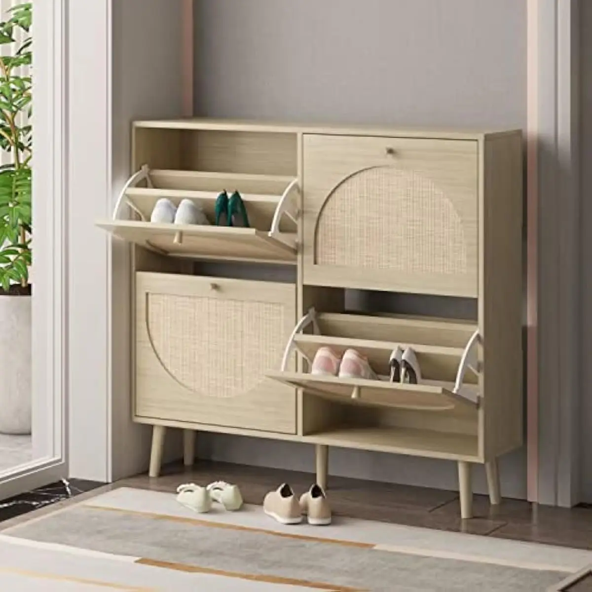 Four-tier compact shoe storage unit featuring woven rattan paneling and hinged drop-down fronts ideal for entryways or tight are