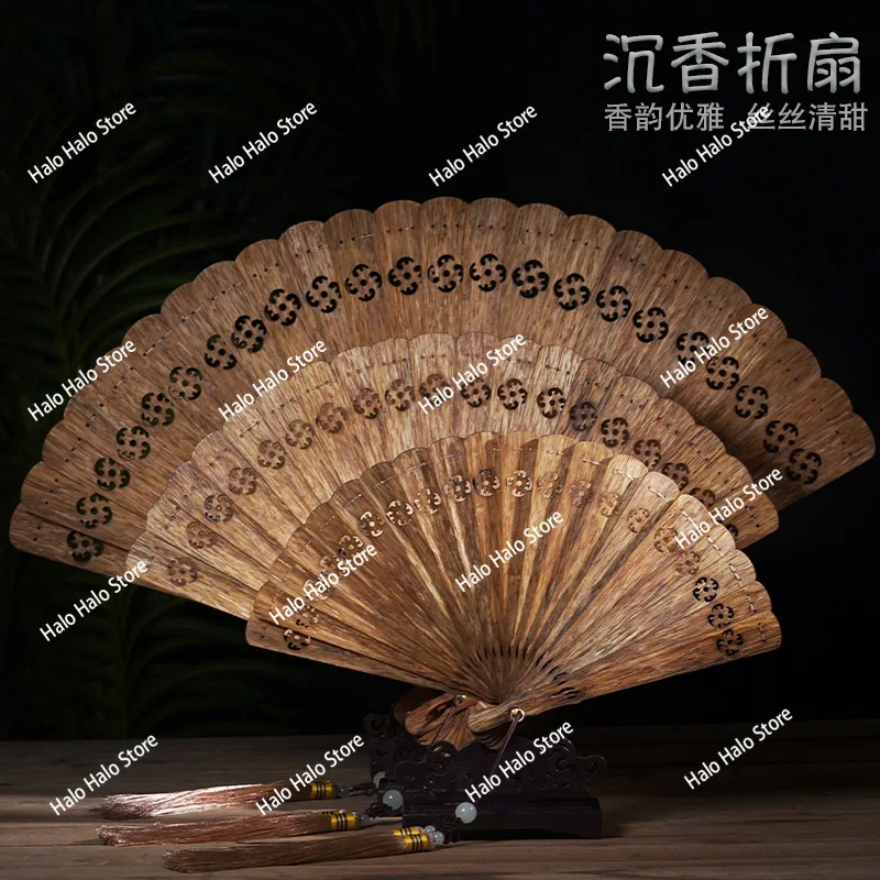 Agarwood folding fan high grease black oil old material hollow fan retro craftsmanship ornament national style gift
