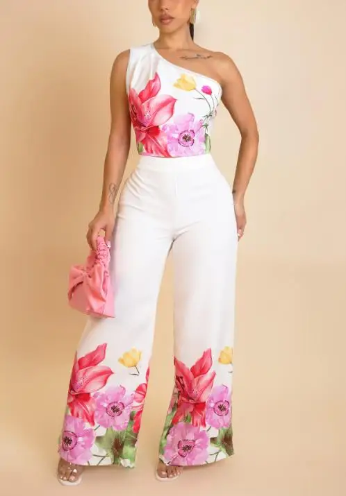 

Комплект из двух предметов. Женский наряд. Лето 2025 г. Новый элегантный укороченный топ на одно плечо с цветочным принтом и широкие брюки с высокой талией.