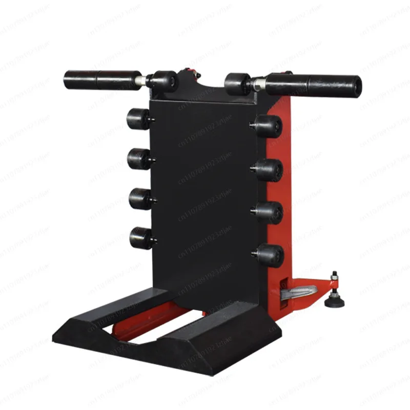 Tire lifting frame for tire removal machine
