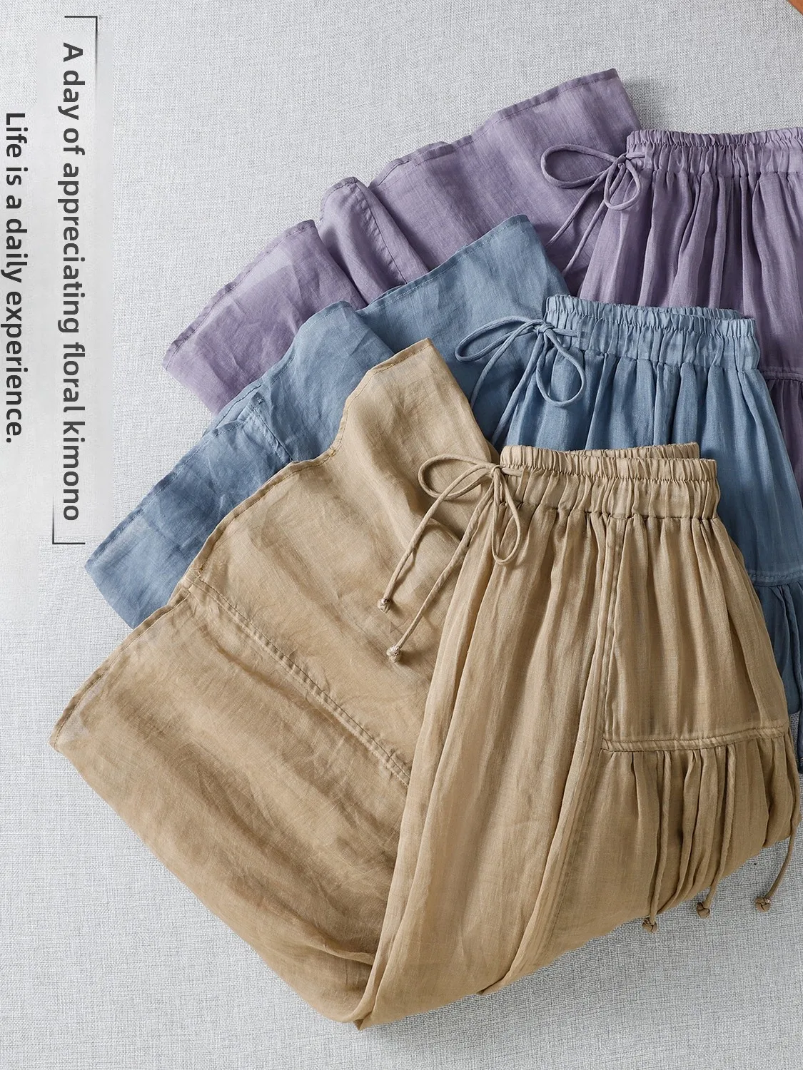 Ele عالية الخصر لون نقي ثنيات فضفاضة مرونة الخصر طويلة عادية ألف خط تنورة حجم كبير الصيف المرأة Faion التنانير