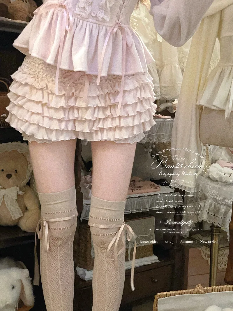 النمط الفرنسي Kawaii الملابس الوردي السراويل القصيرة كريم سحابة الخريف والشتاء جديد الحلو كولوتيس محبوك الطبقات كعكة تنورة السراويل