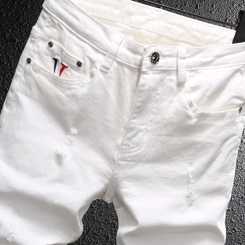 

Newly Designer Fashion Men Jeans White Stretch Slim Fit Casual Ripped Jeans Men Embroidery Vintage Leisure Denim Pants Hombre