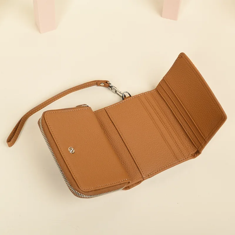 

Короткий кошелек из натуральной кожи для женщин 2026, двойной сложенный кошелек из натуральной коровьей кожи, мини-портмоне для карт, клатч, сумка для денег с ремешком на запястье