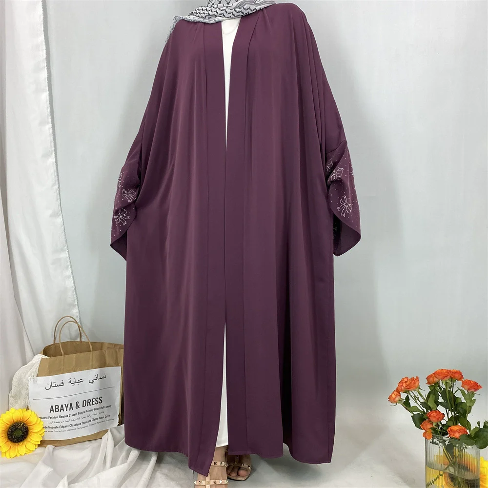 

Ramadan Morocco luxury diamond hot stamping Muslim women's clothing Islamic bow robe new temperament long sleeved cardigan Dubai