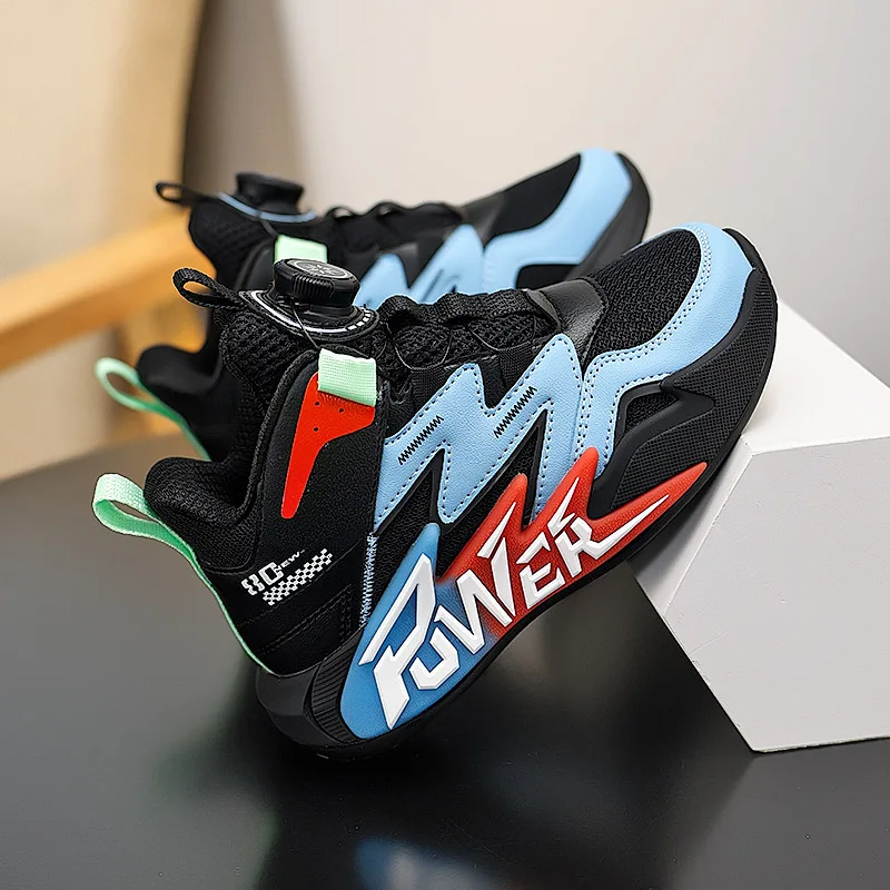

A pair of breathable children's all-weather sports basketball shoes with a rotating-style shoelaces. CT-L8807