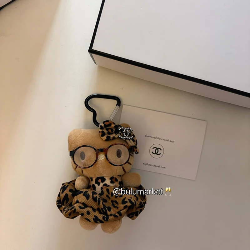 سانريو مرحبا كيتي الجلد الداكن أفخم المفاتيح Kawaii بلوشي محشوة اللعب دمية قلادة لحقيبة الظهر محفظة الفتيات حقيبة الملحقات