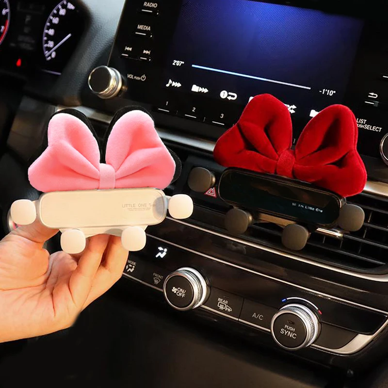 Cute Cartoon Red Bow Uniwersalny grawitacyjny uchwyt samochodowy na telefon GPS Stojak na telefon Kreatywny uchwyt na telefon komórkowy z klipsem do automatycznego odpowietrznika