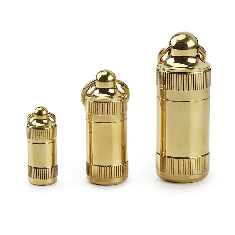 Porta pastillas de latón con llavero impermeable mini dorado