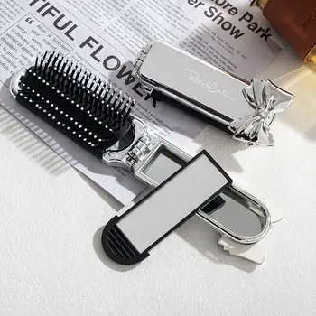 Espejo de viaje plegable, cepillos para el pelo, cepillo de bolsillo plegable, mini peine para peluquería en casa, todo tipo de cabello, peine con cojín de aire. 10 best sales Cepillo de pelo portátil - №1