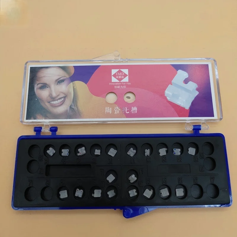 

Dental IMD Ceramic Bracket MBT Mesh Base Straight Wire Orthodontic Bracket Aesthetic Braces for Teeth Alignment
