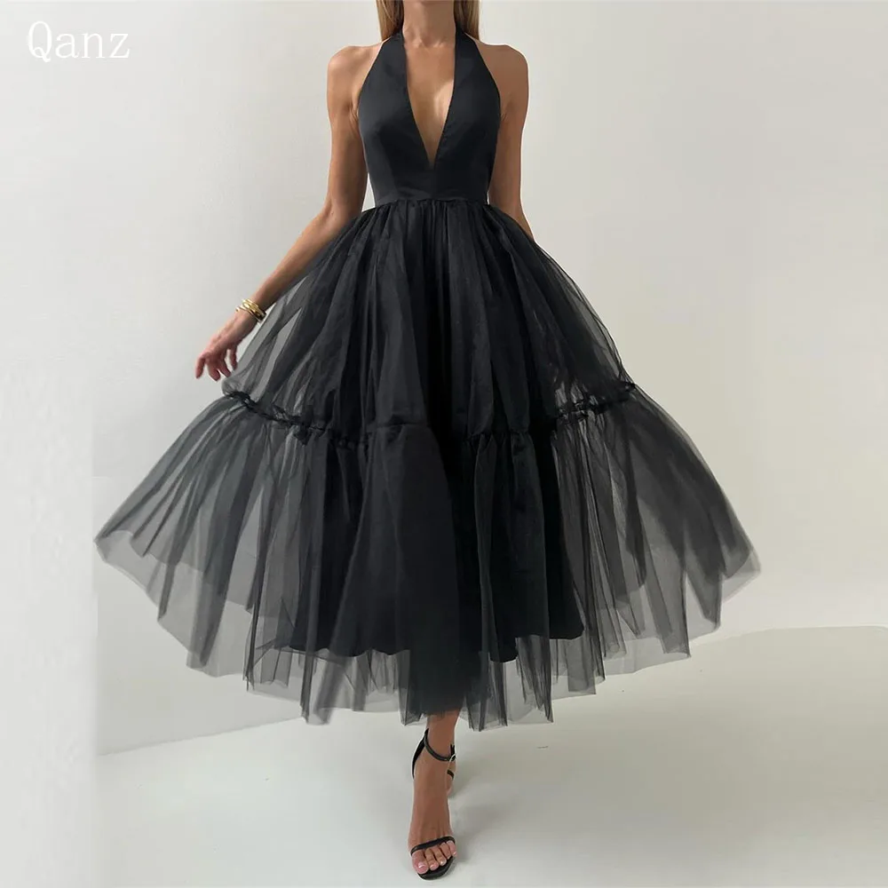 

Qanz Modest Black Prom Dresses Tulle Tea Length Backless Ruffles Dubai Evening Dress A Line Halter Plus Size dress Party Night