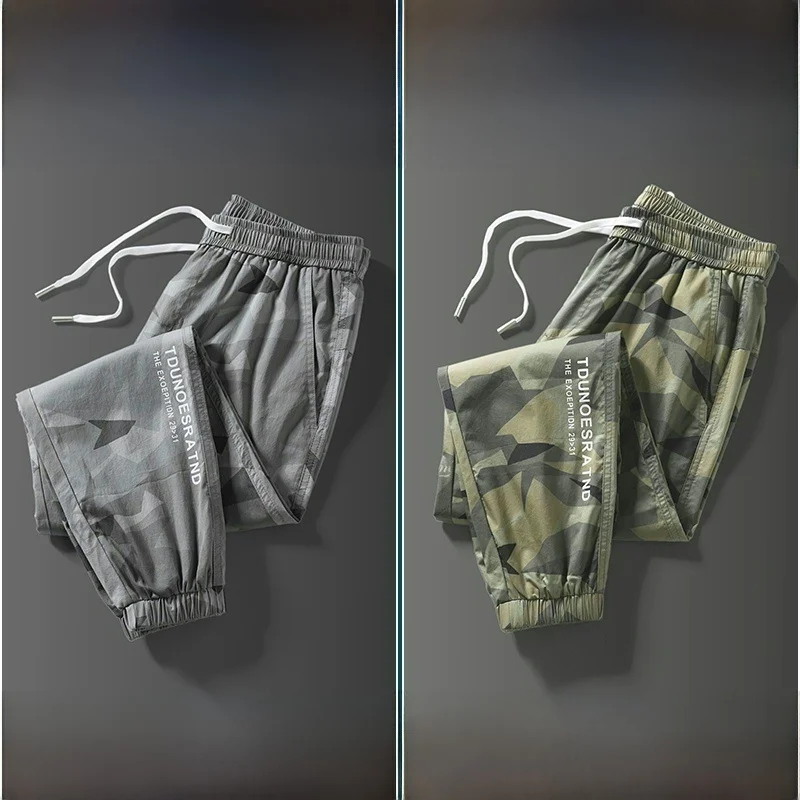 กางเกงคาร์โก้ผู้ชายทรงฮาร์แลน ผ้าไหมน้ำแข็ง ใส่สบาย ทนทานต่อการสึกหรอ ทำความสะอาดง่าย เหมาะกับฤดูใบไม้ร่วง ทรงหลวม ทันสมัย สไตล์วัยรุ่น สีดำ