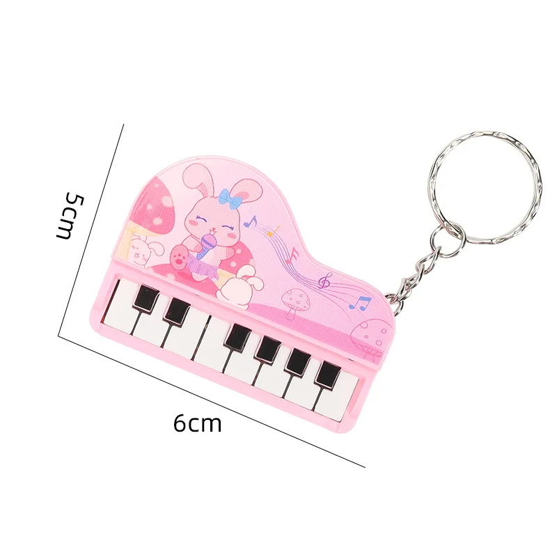 Criativo dos desenhos animados música piano eletrônico chaveiros engraçado brinquedos de som mini instrumento musical piano pingente chaveiro presente aniversário