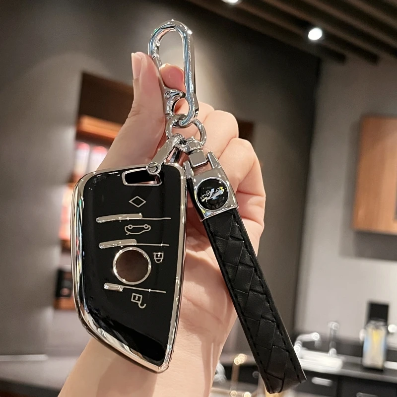 حافظة مفاتيح السيارة غطاء مفتاح حامل سلسلة المفاتيح الجلدية لسيارات BMW X1 X2 X3 X4 X5 غطاء مفتاح BM 1 Series 2 3 4 5 6 7 Series