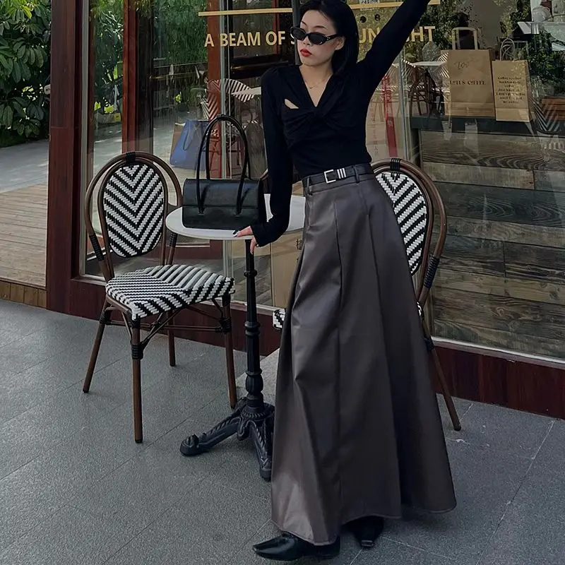 

Pu Leather Simple Elegant Deisgn Long Women Skirt 2024 Autumn Fashion Slim Waist Swing Jupes Sexy Design Skirt