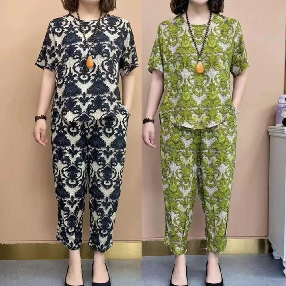 2024 Summer New Mom's Short Sleeved Suit Middle Aged And Elderly Floral Nine Point Pants 2 Piece Set Round Neck Pajama For Women