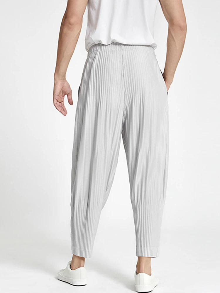 Miyake-pantalones bombachos plisados de Color liso para hombre, pantalón informal, holgado, con bolsillo y cintura elástica, novedad de verano 2025, 2025