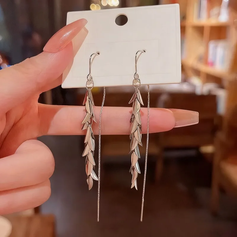 Trendy long pearl tassel earrings featuring sweet ethereal butterfly pattern fashionable elegant design that helps make face loo