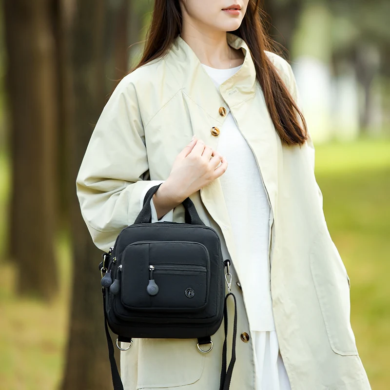 Modische, leichte Umhängetasche für Damen, vielseitige Handtasche mit mehreren Fächern, quadratische Form, Schultertasche, multifunktionale Tasche mit Tragegriff. – Detail 13