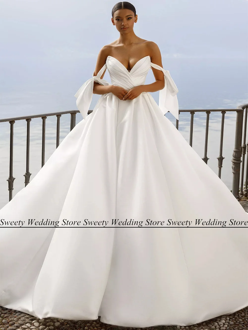 

Modern Satin Wedding Dress Custom Design Deep V Neck Off The Shoulder Bow Pleat Ball Gown Court Train Africa Bridal Dresses