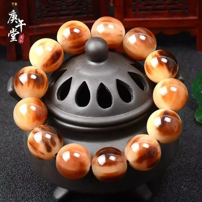 

Authentic Style Red Flower Blood Silk Yak Men and Women Natural Tibetan Horn Bracelet ** Fortune Buddh