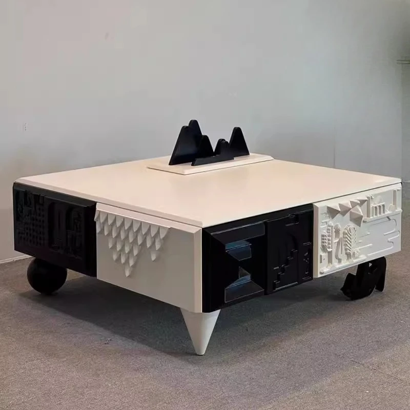

Designer creative relief coffee table black and white baking paint minimalist tea table designer French light luxury fashion