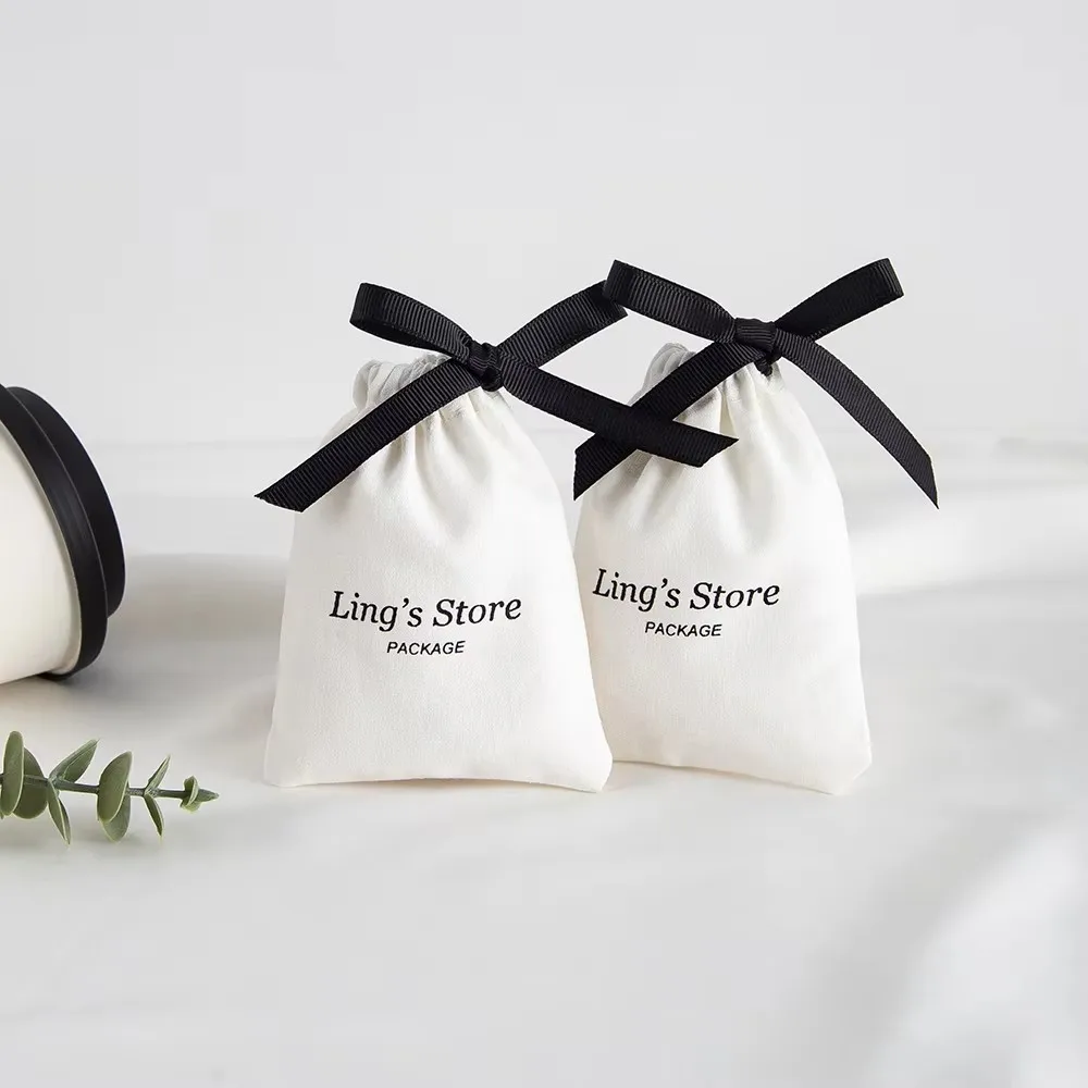 

50/100 шт., классическая подарочная упаковка, белый хлопковый мешочек, ювелирный парик на шнурке, косметический органайзер, микрофон, цифровые устройства