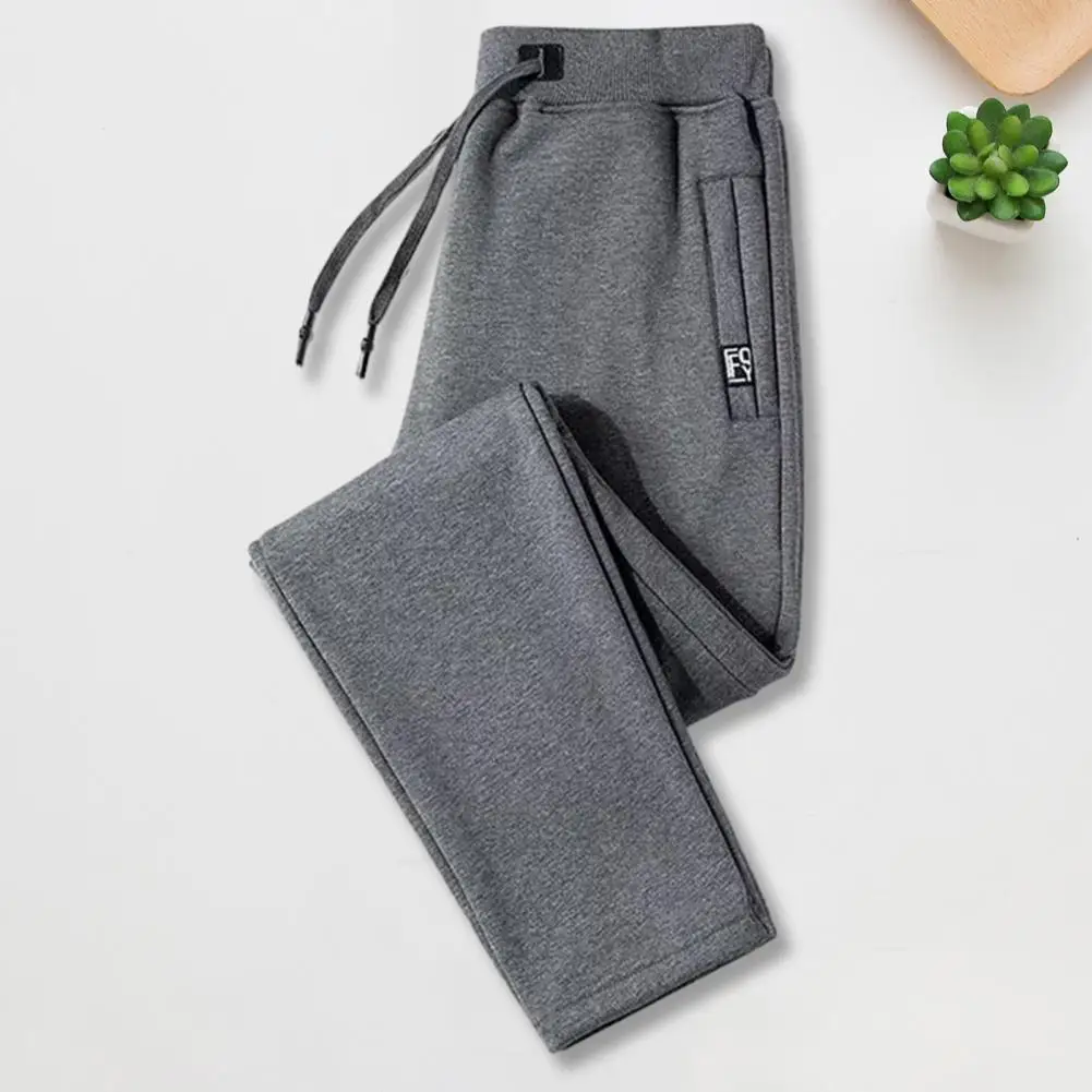 

Men Fleece Lining Sweatpants Cozy Men's Fleece-lined Jogger Pants Elastic Waist Drawstring Pockets for Autumn/winter Sports Male