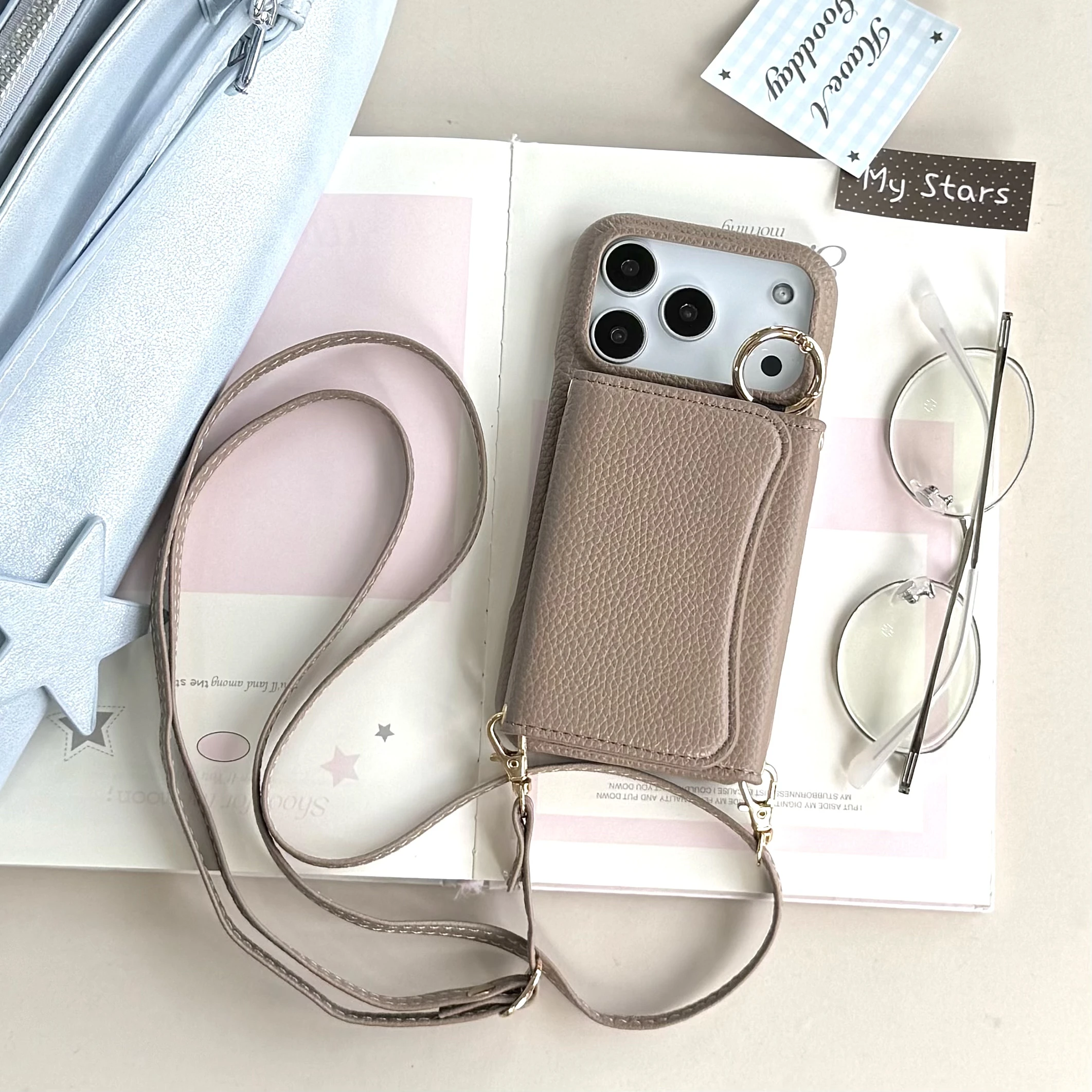 Funda de cuero tipo billetera magnética con soporte de anillo cruzado semicircular para iPhone 17 Pro Max 16 Plus 15 Plus 14 13 funda con cordón largo