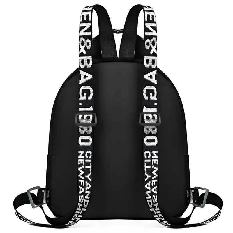 Neutral style backpack for men and women, with shoulder straps featuring letter prints and multiple pockets.