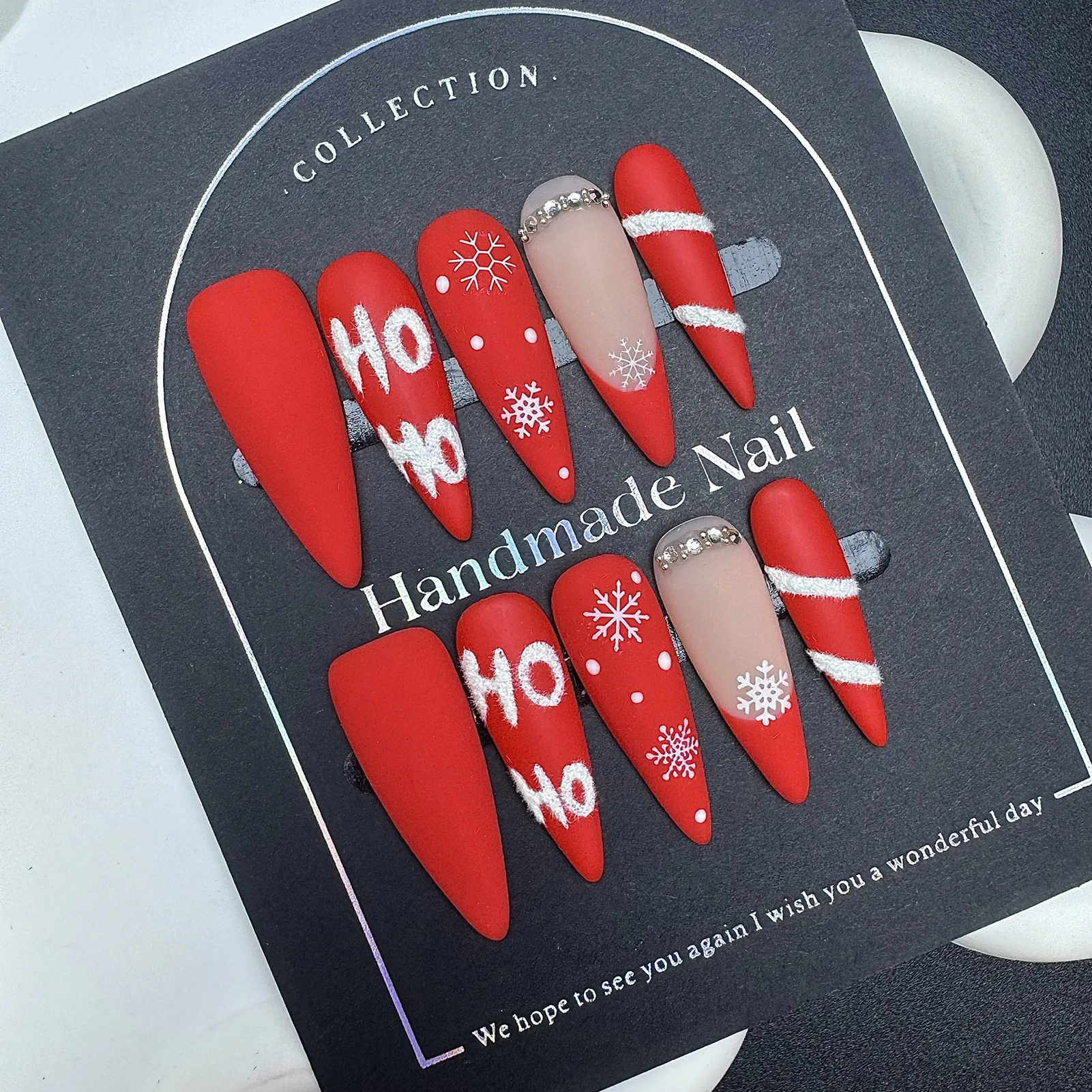 10 قطعة عيد الميلاد الأحمر طويل وأشار الصحافة على الأظافر اليدوية يمكن ارتداؤها ندفة الثلج HO HO مطبوعة وهمية مسمار نصائح الفرنسية أظافر صناعية التصحيح