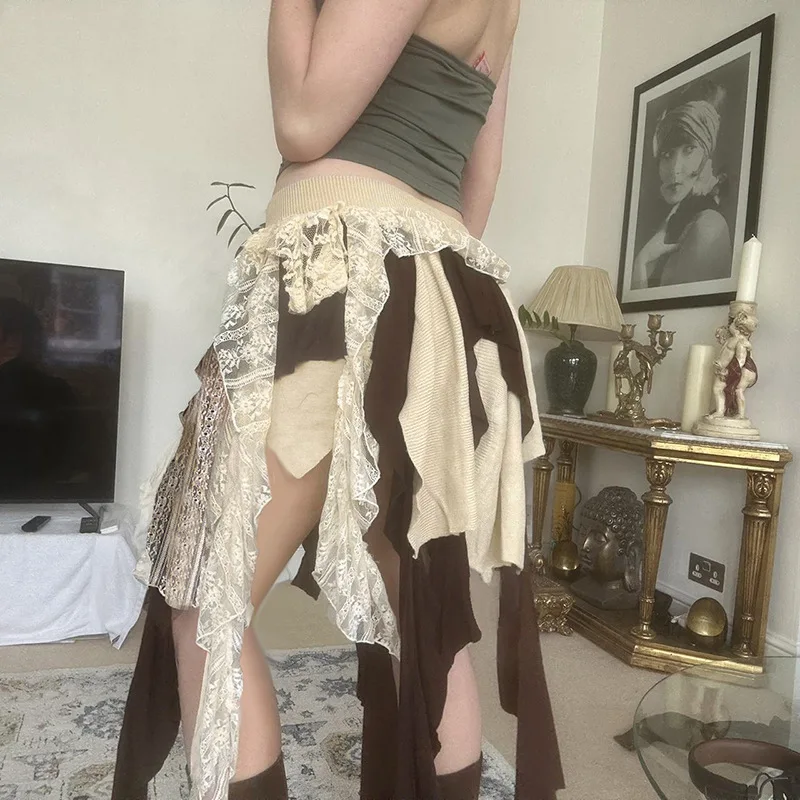 SKMY 2025 موضة جديدة ثقافة فرعية تصميم المرقعة منخفضة الخصر التنانير فتاة حار غير النظامية الشريط مع بطانة التنانير النساء