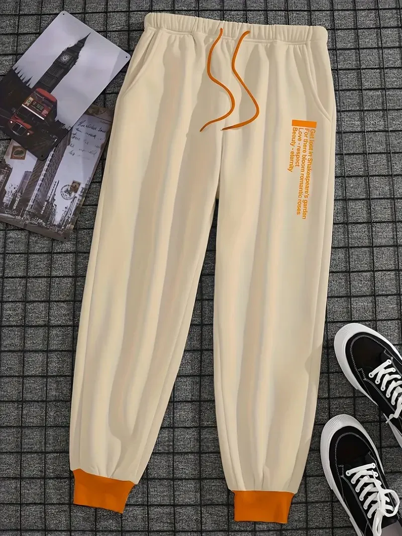 

The new men's trousers for Spring and Autumn 2025 are comfortable soft casual and simple with letter prints