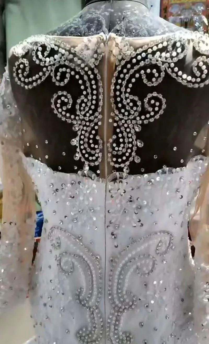 فستان زفاف كريستالي مخصص بسحاب خلفي وأكمام طويلة من فيستدوس دي نوفيا وأكمام طويلة فساتين زفاف