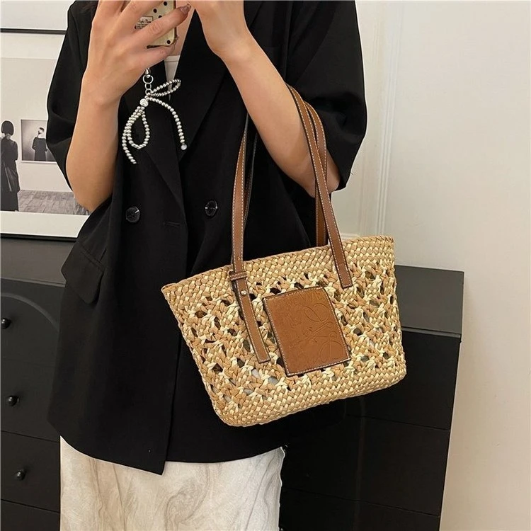 

2026 New Hollow Paper Handheld Woven Bag, A Must for Vacation Travel Photo Clock in Simple Fashion Casual Versatile Bag
