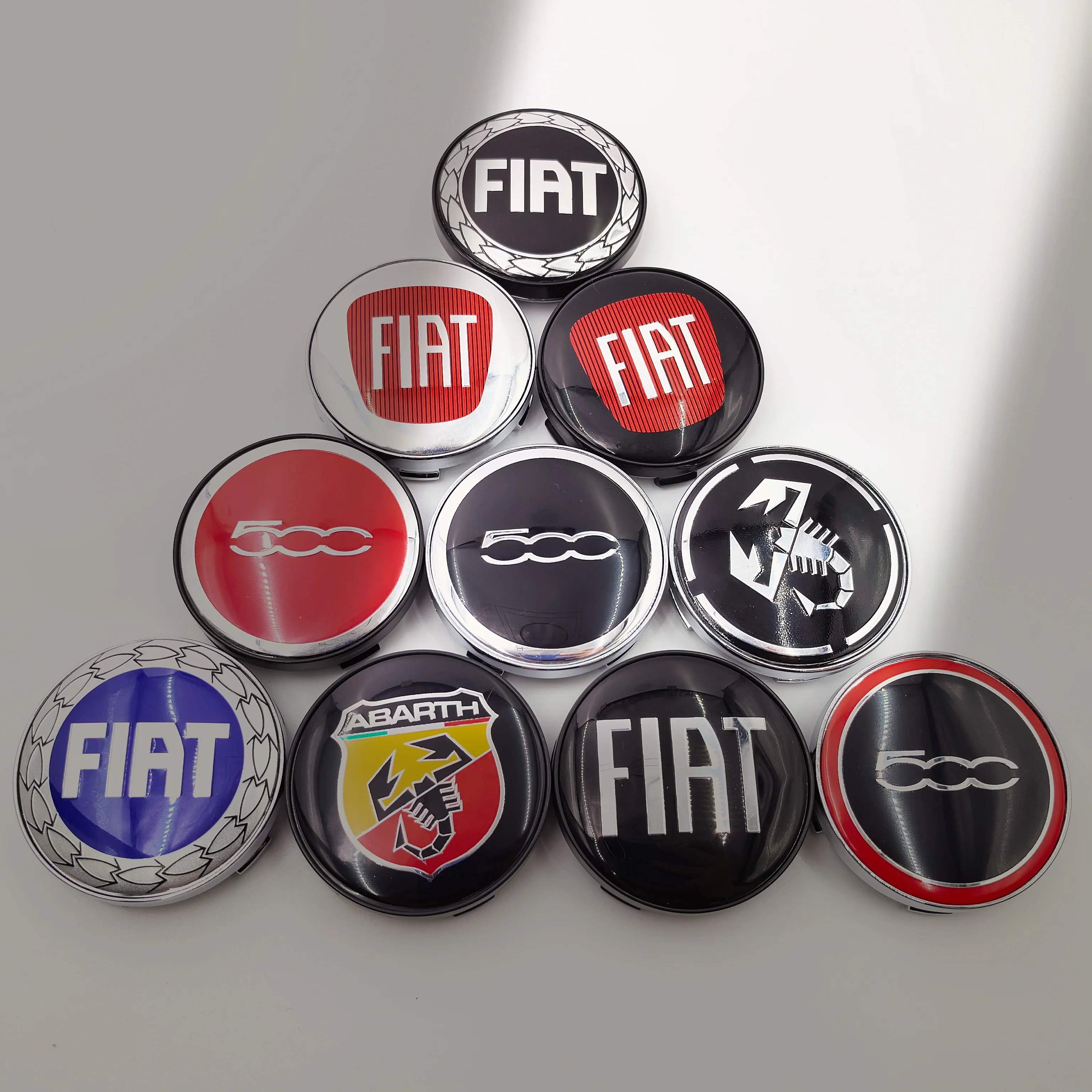 4ps Fiat tapa central del cubo de la rueda del coche 60mm 6cm cubiertas a prueba de polvo para logo Fiat 500 124 125 Punto Bravo Stilo Panda Abarth emblemas de llanta