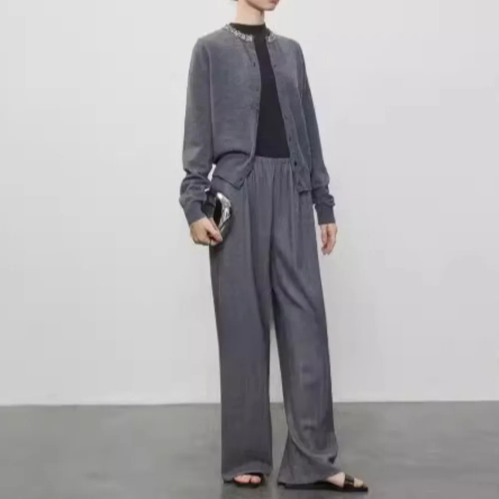 

Шерстяные брюки с широкими штанинами для ранней осени