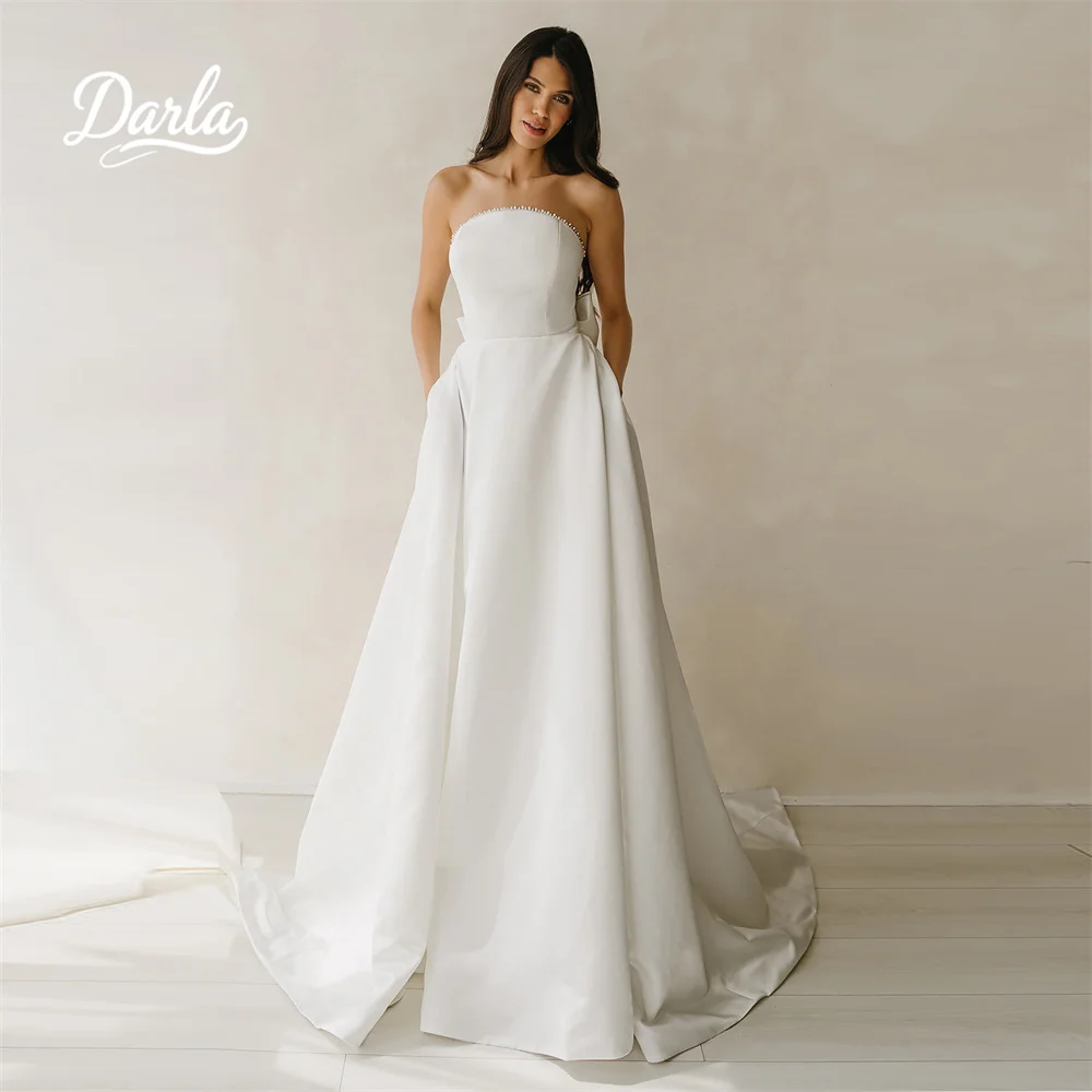

Darla Customized Strapless Back Bow A-Line Wedding Dress Sweep Train Simple Design Sleeveless Pearls 2025 Zipper Morden Newest