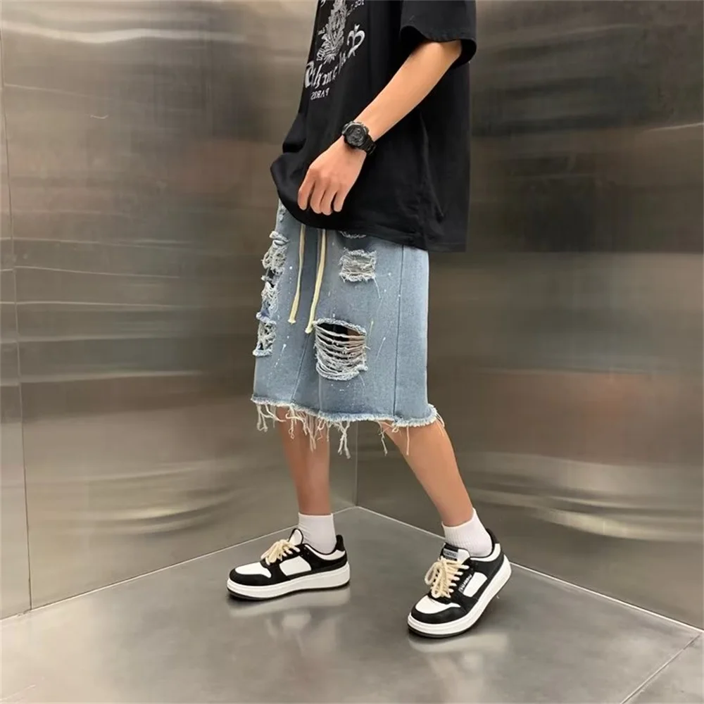 Ripped denim shorts men's fifth pants trendy all-match men's loose woolen shorts Men's split stitching short jeans ropa hombre