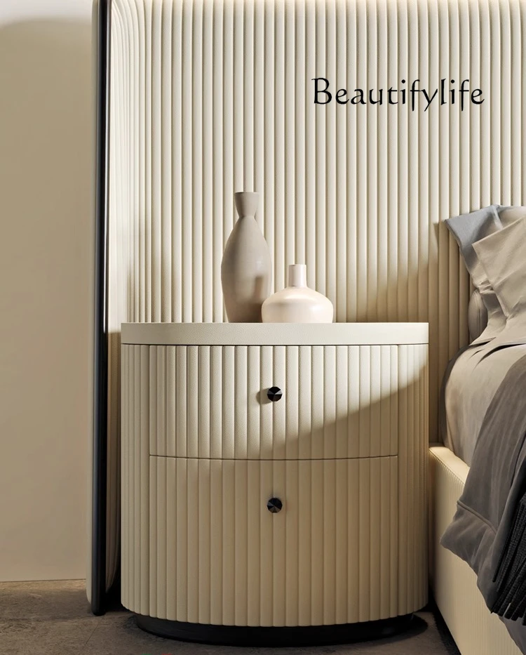 

Italian minimalist Italian light luxury round bedside table high-end marble French designer fashion