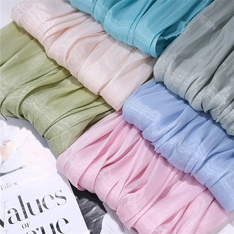 

Silk soft crepe yarn silk satin feel soft drape yarn sewing clothing skirt yarn fabric silk scarf background sparkling fabric