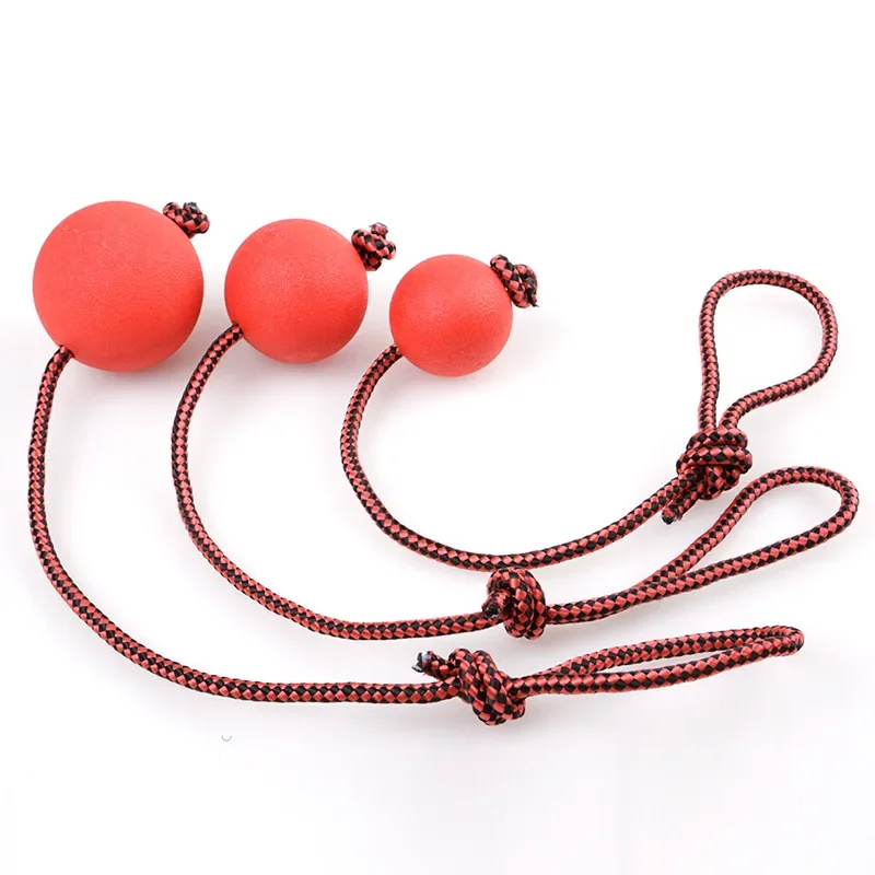 Bola de entrenamiento de goma sólida para masticar perros, juguetes para limpiar los dientes, pelota para masticar para cachorros, juego de mascotas, juguete de entrenamiento para masticar con mango de cuerda