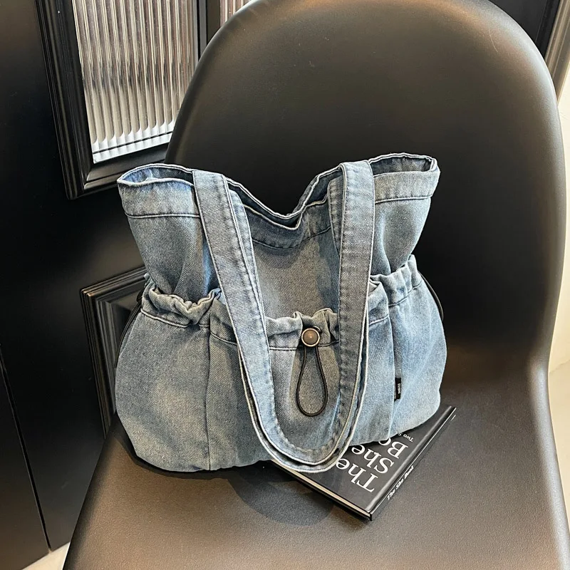 

Japanese retro canvas shoulder bag 2025 new denim tote bag large capacity women's commuter literary drawstring bundle handbag